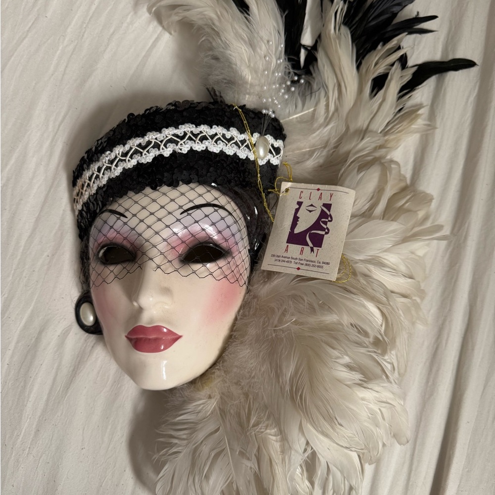 Elegant Black and White Feathered Headpiece
